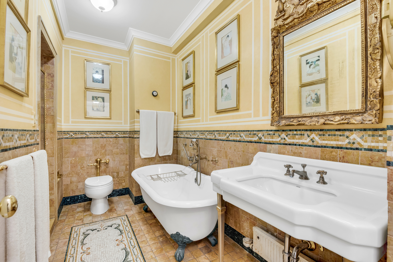115 Central Park West, Unit 3B Manhattan, NY 10023 - Photo 10 of 20 a bathroom with a sink and a mirror
