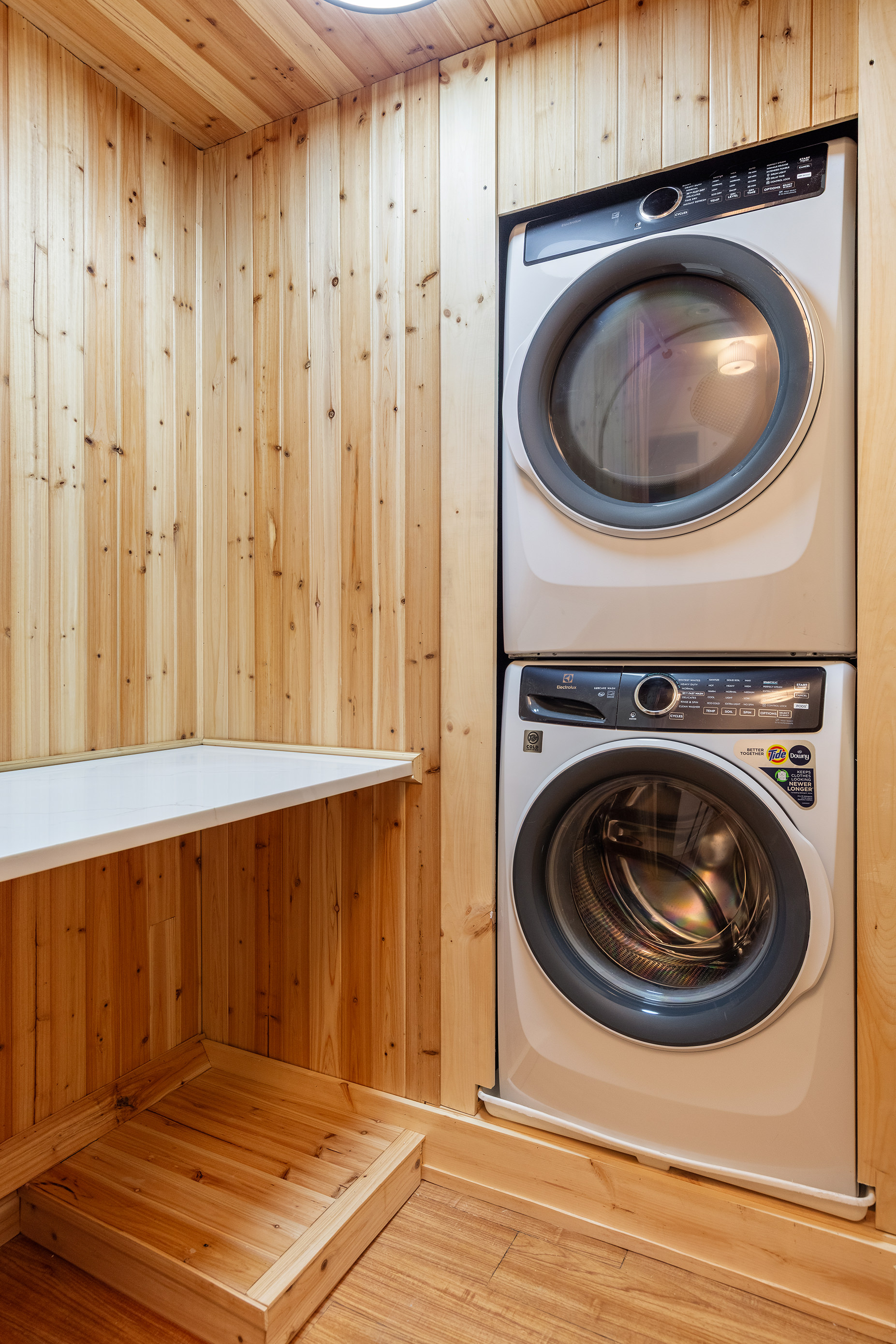129 East 61st Street, Unit 3 Manhattan, NY 10065 - Photo 8 of 13 a utility room with dryer and washer