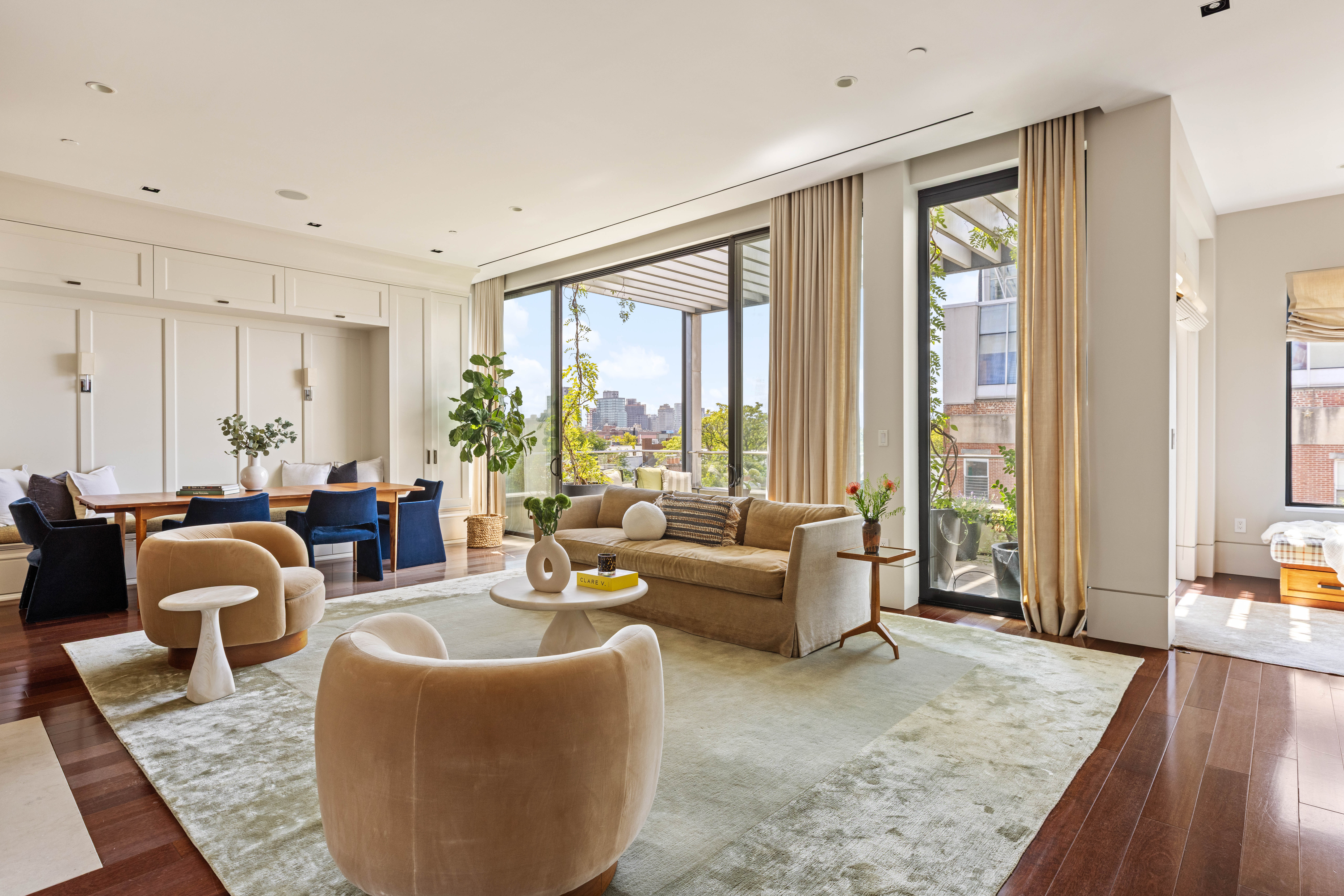 17 Bergen Street, Unit 4/PH Brooklyn, NY 11201 - Photo 2 of 21 a living room with furniture and a large window