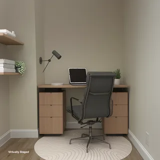 a view of workspace with wooden floor