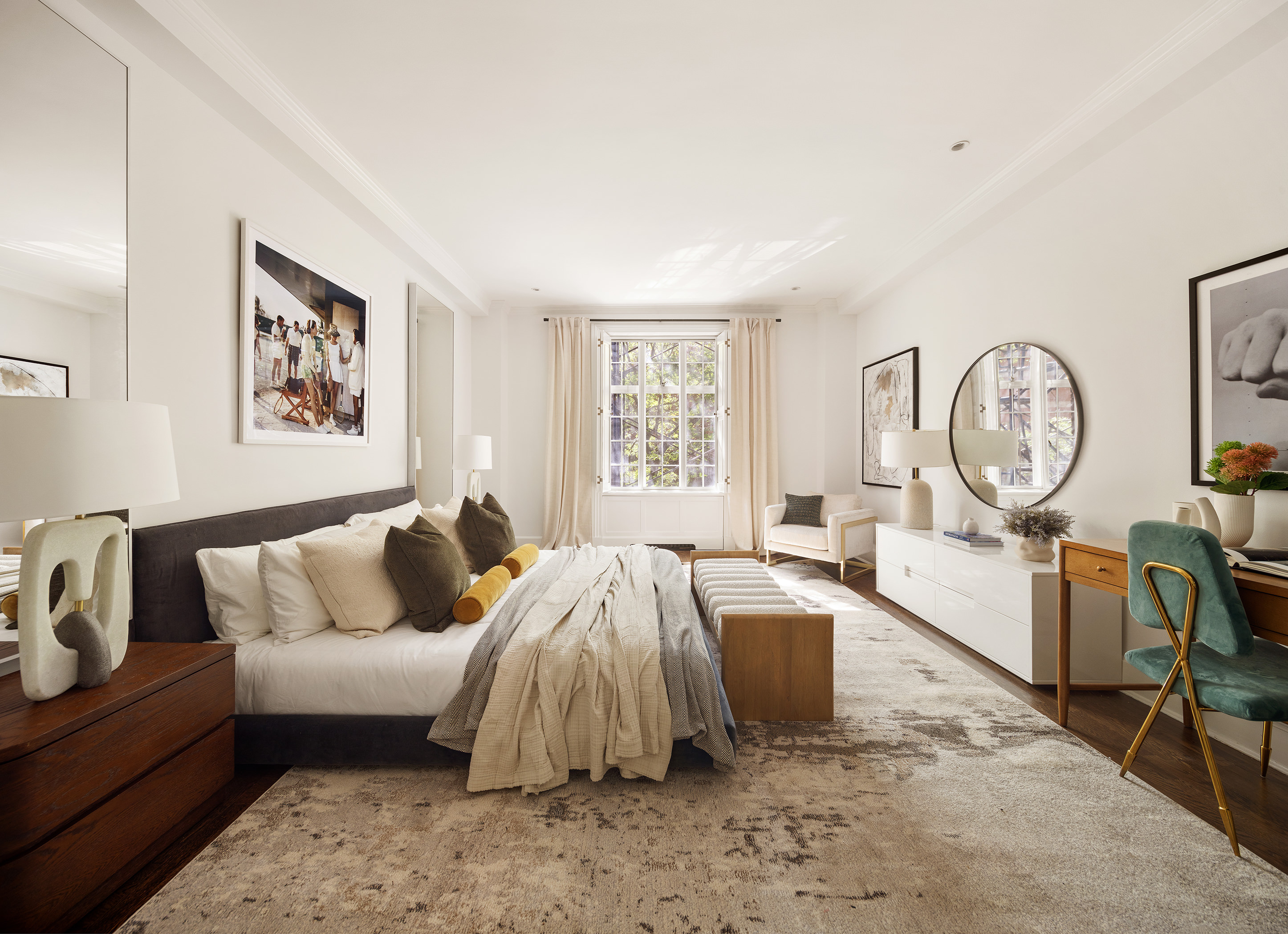 115 East 67th Street, Unit 3C Manhattan, NY 10065 - Photo 11 of 21 a bed room with bed and a large window