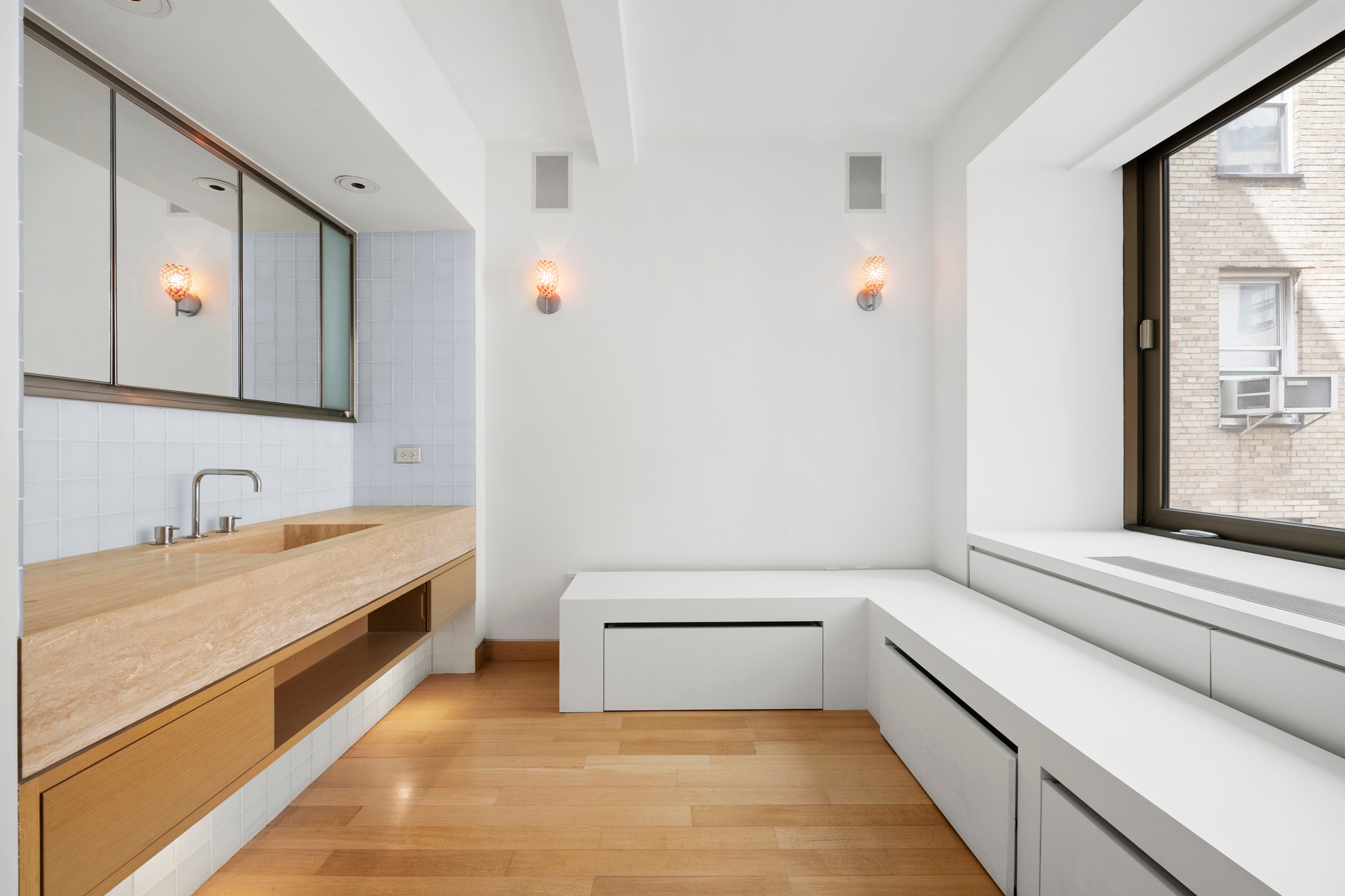 50 Gramercy Park North, Unit 15A Manhattan, NY 10010 - Photo 24 of 29 a bathroom with a tub sink and mirror