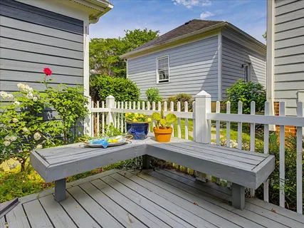 a aerial view of a house roof deck and living room