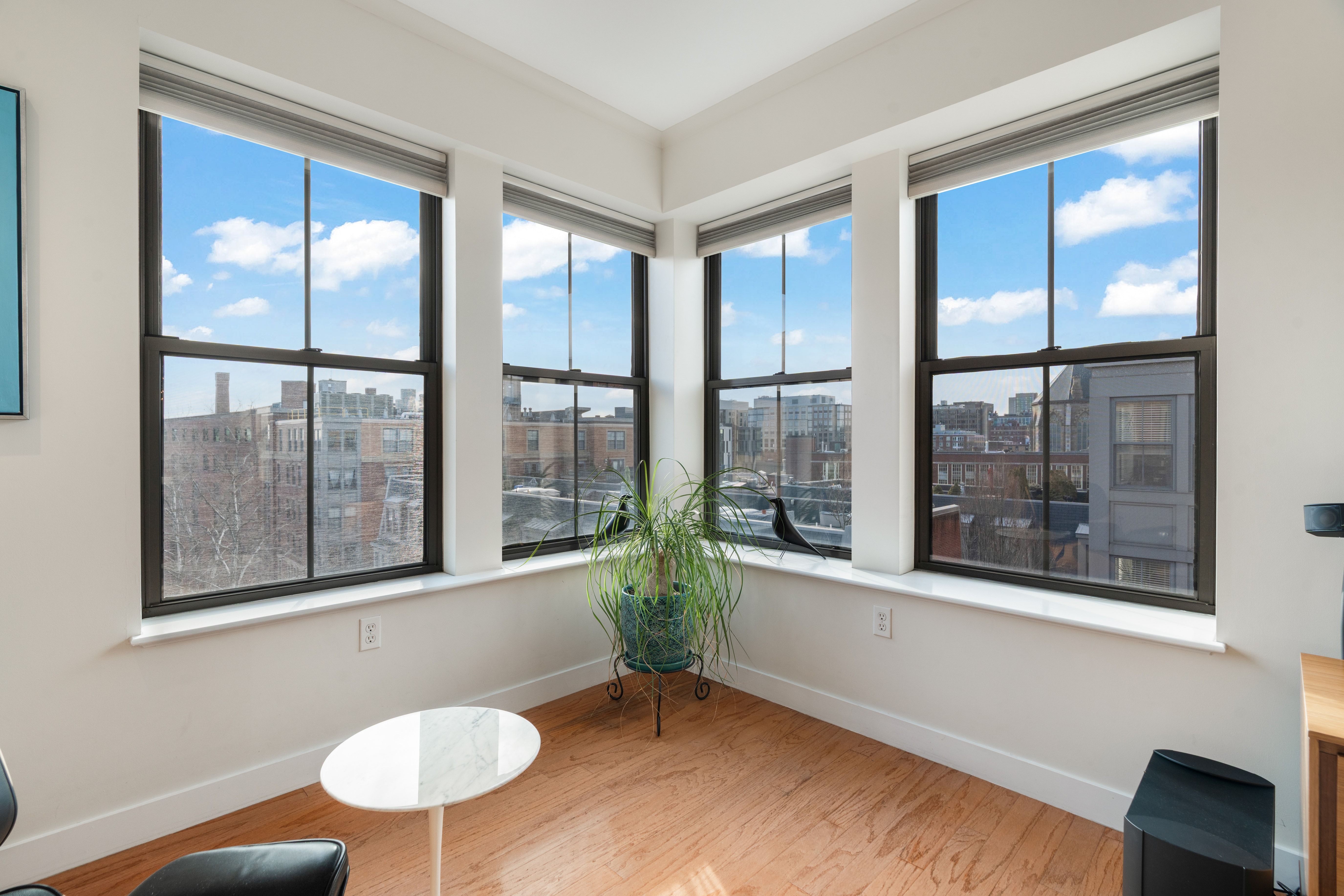 2 Rollins Street, Unit D601 Boston, MA 02118 - Photo 7 of 29 a view of an empty room with a window and wooden floor