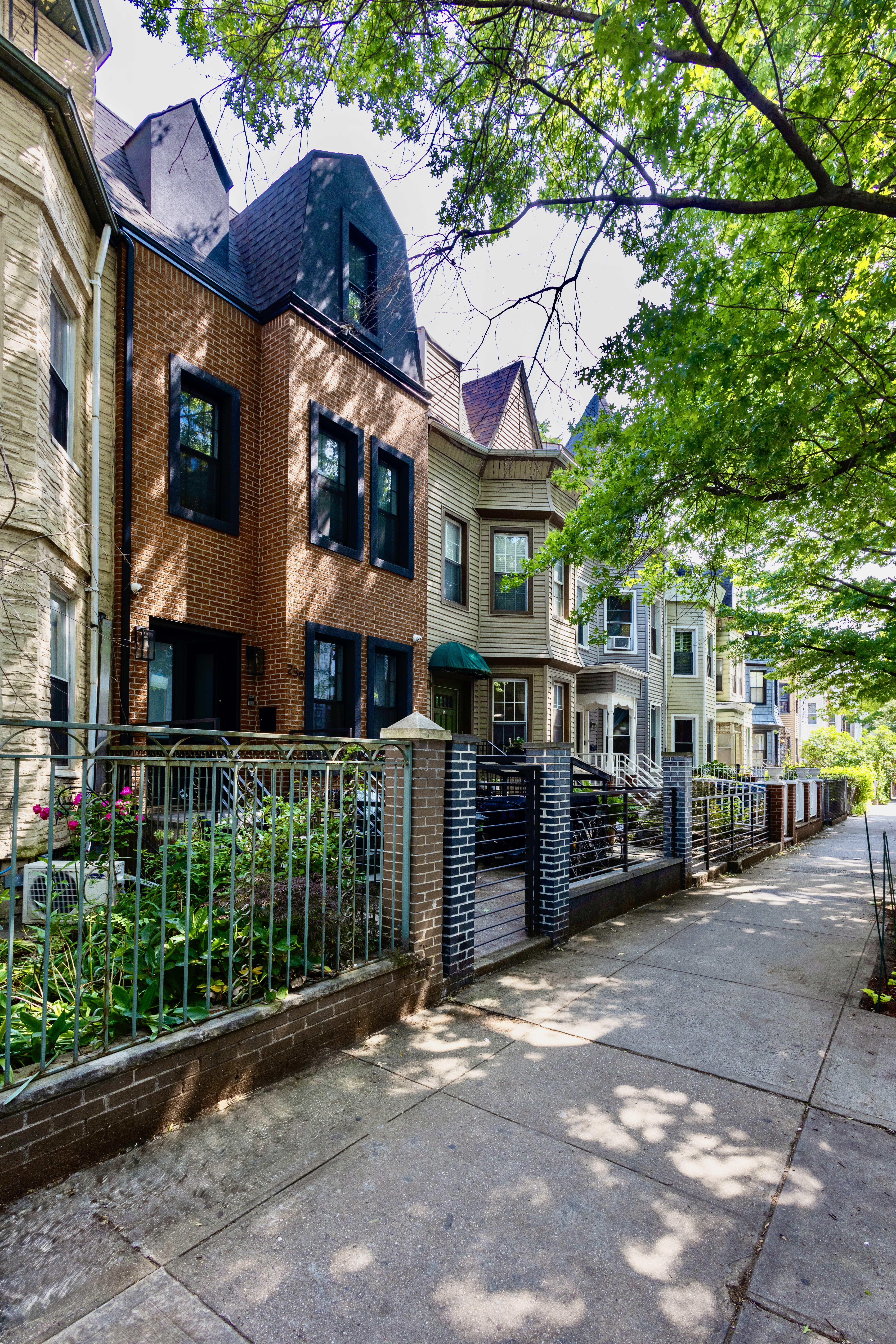 239 Winthrop Street Brooklyn, NY 11225 - Photo 19 of 20 a view of a house with a garden and pathway