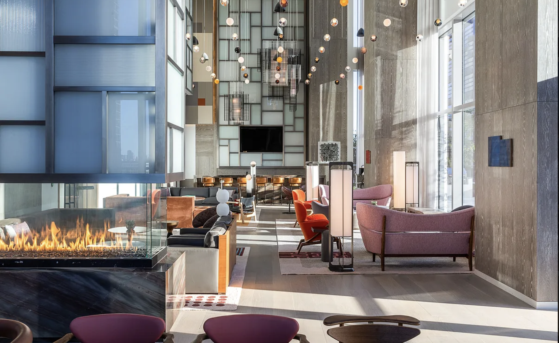 1 City Point, Unit 57A Brooklyn, NY 11201 - Photo 13 of 23 a living room with furniture and a flat screen tv