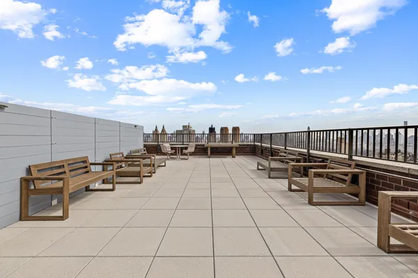 a view of terrace with seating area and barbeque oven
