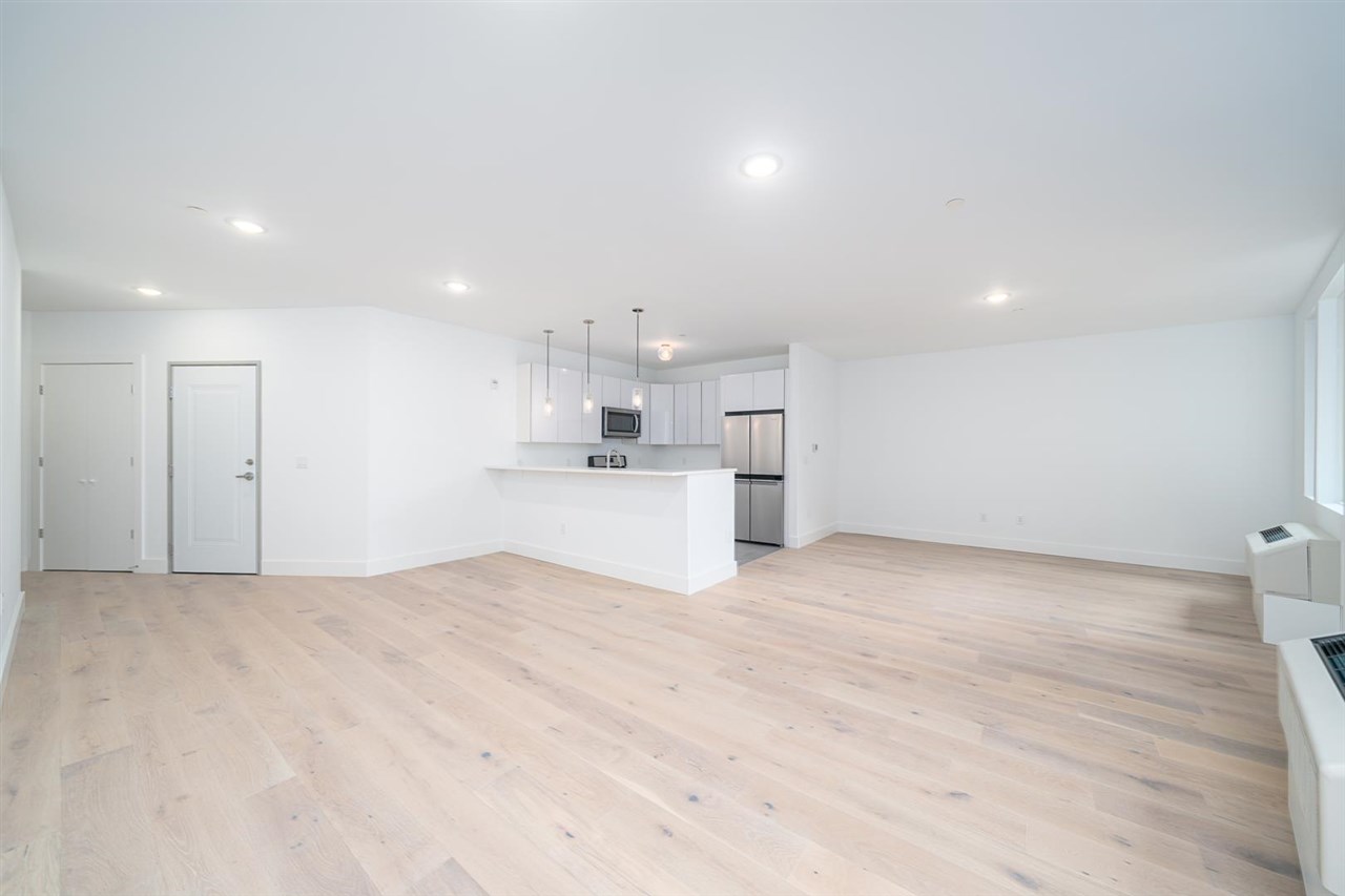 8621 River Road, Unit 6D North Bergen, NJ 07047 - Photo 7 of 36 a view of a kitchen with a sink and a refrigerator