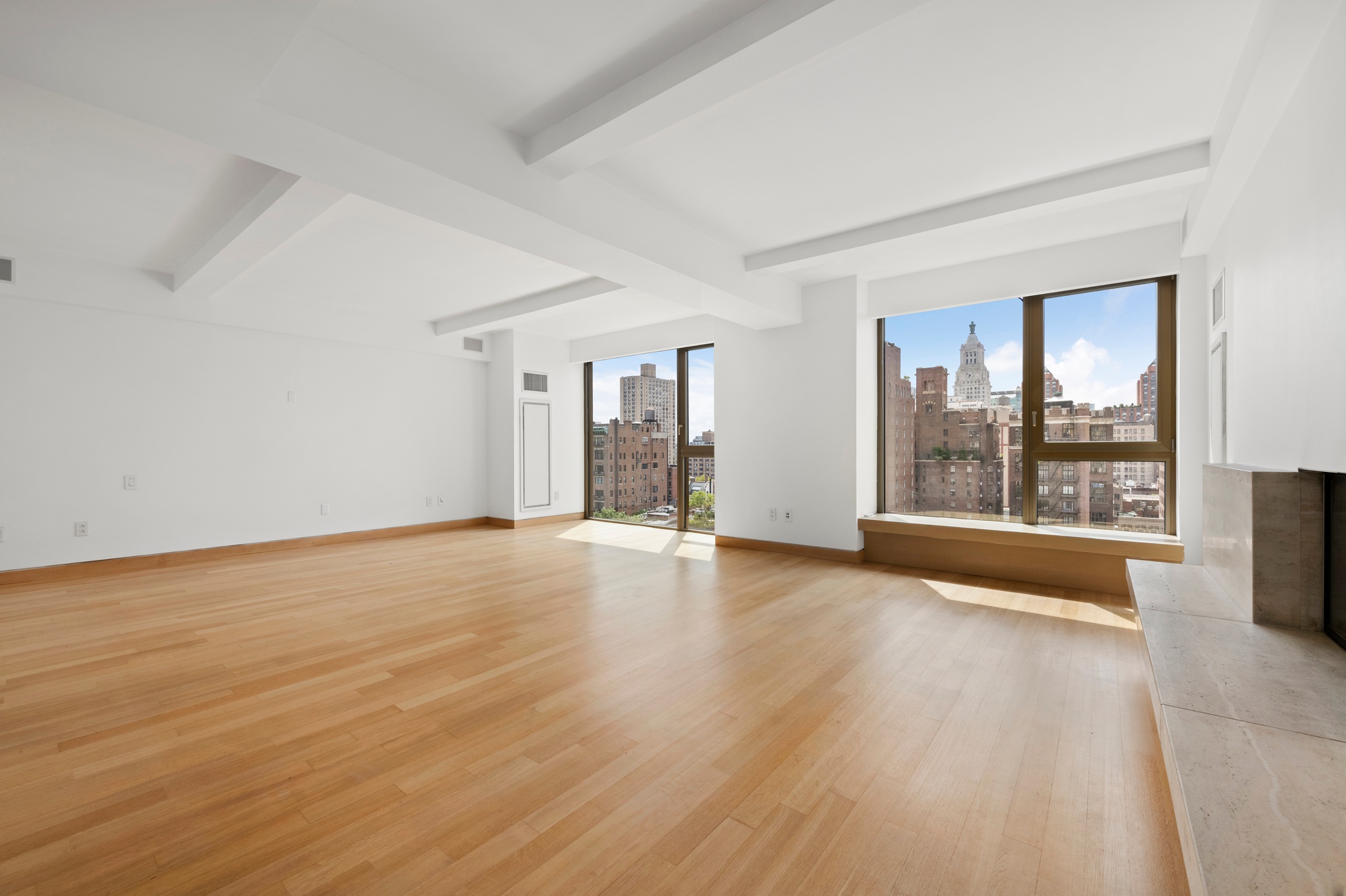 50 Gramercy Park North, Unit 15A Manhattan, NY 10010 - Photo 18 of 29 a view of an empty room with a window and wooden floor