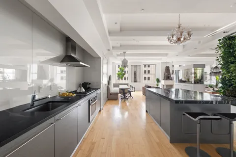 a kitchen with granite countertop lots of counter top space