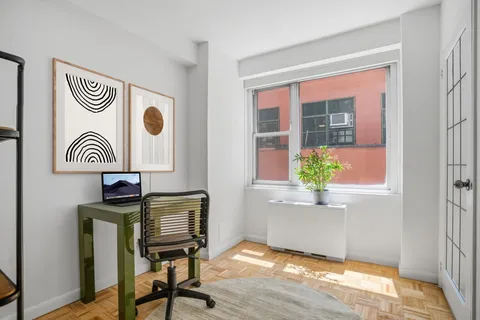 a view of a door and chair in a room