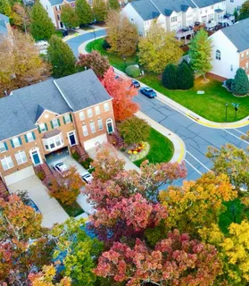 an aerial view of a house with a garden