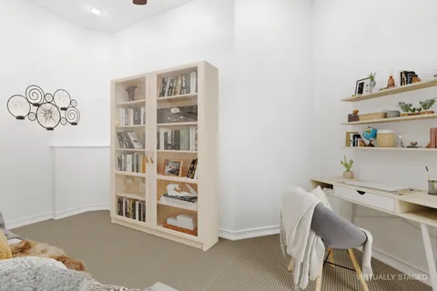 a view of a workspace with furniture