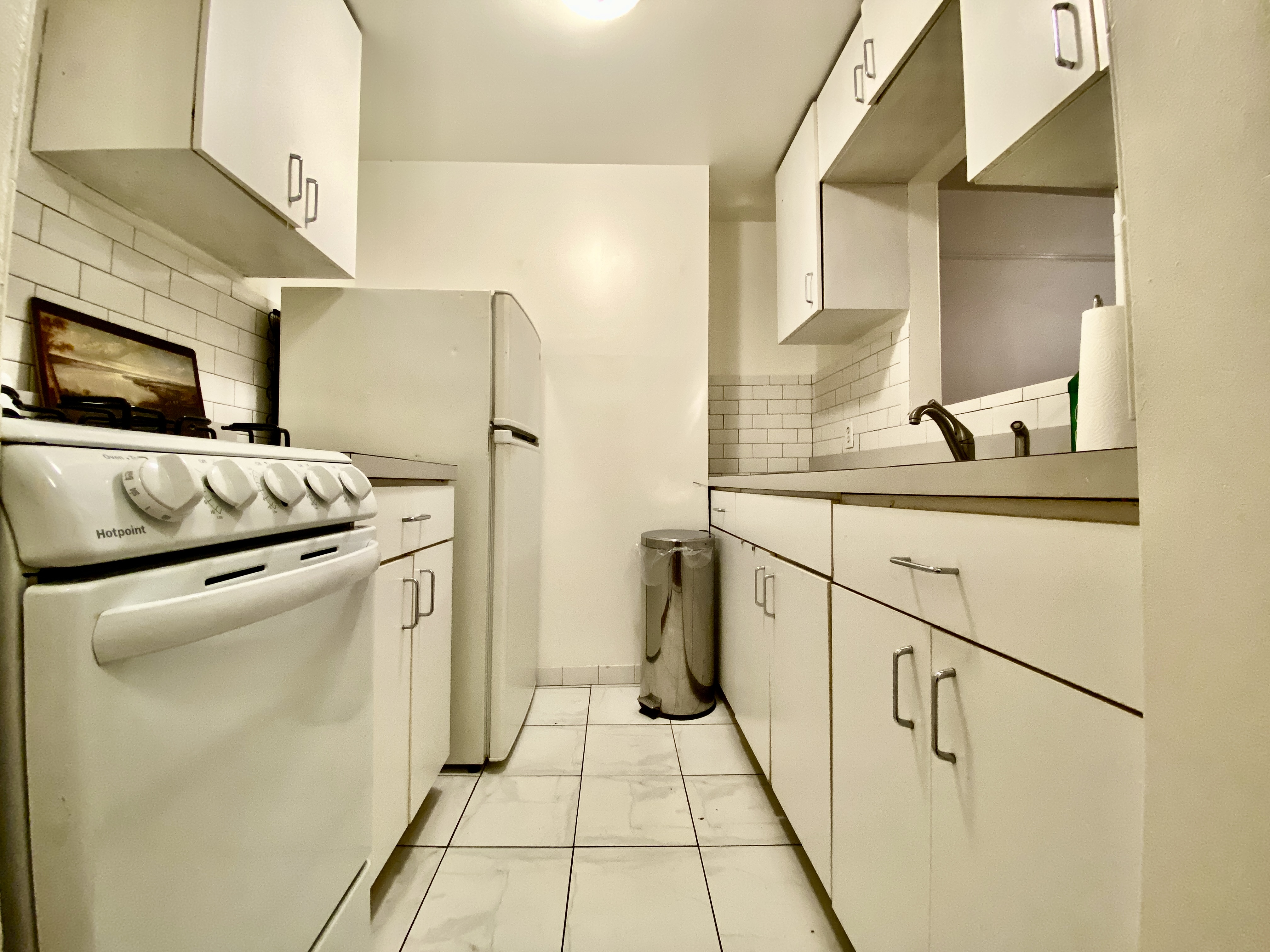 119 Gates Avenue, Unit 1 Brooklyn, NY 11238 - Photo 3 of 11 a utility room with dryer and washer