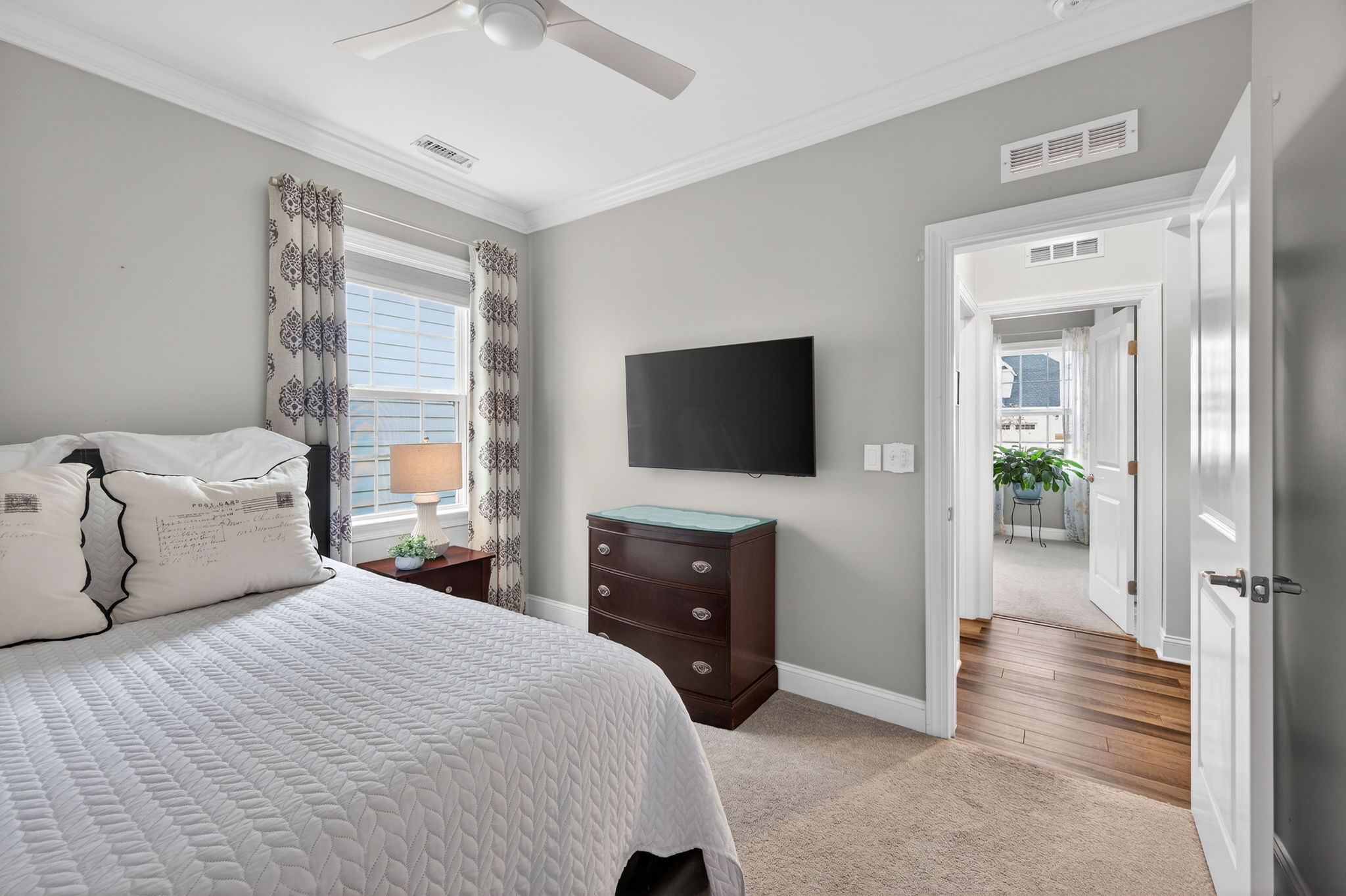 118 Mahogany Run Raleigh, NC 27610 - Photo 28 of 43 a bedroom with a bed and a flat screen tv