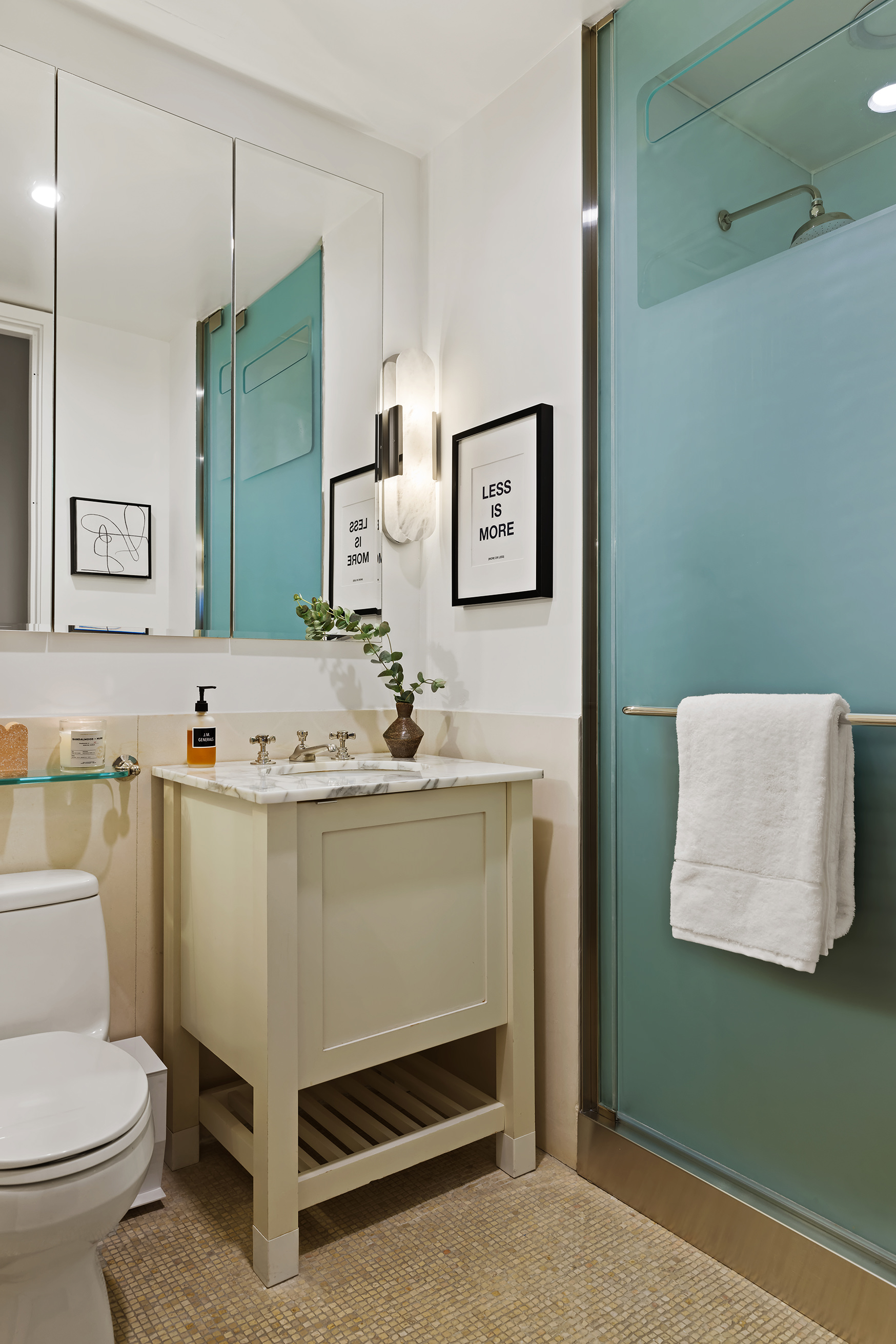 92 Laight Street, Unit 5E Manhattan, NY 10013 - Photo 24 of 26 a bathroom with a toilet sink and mirror