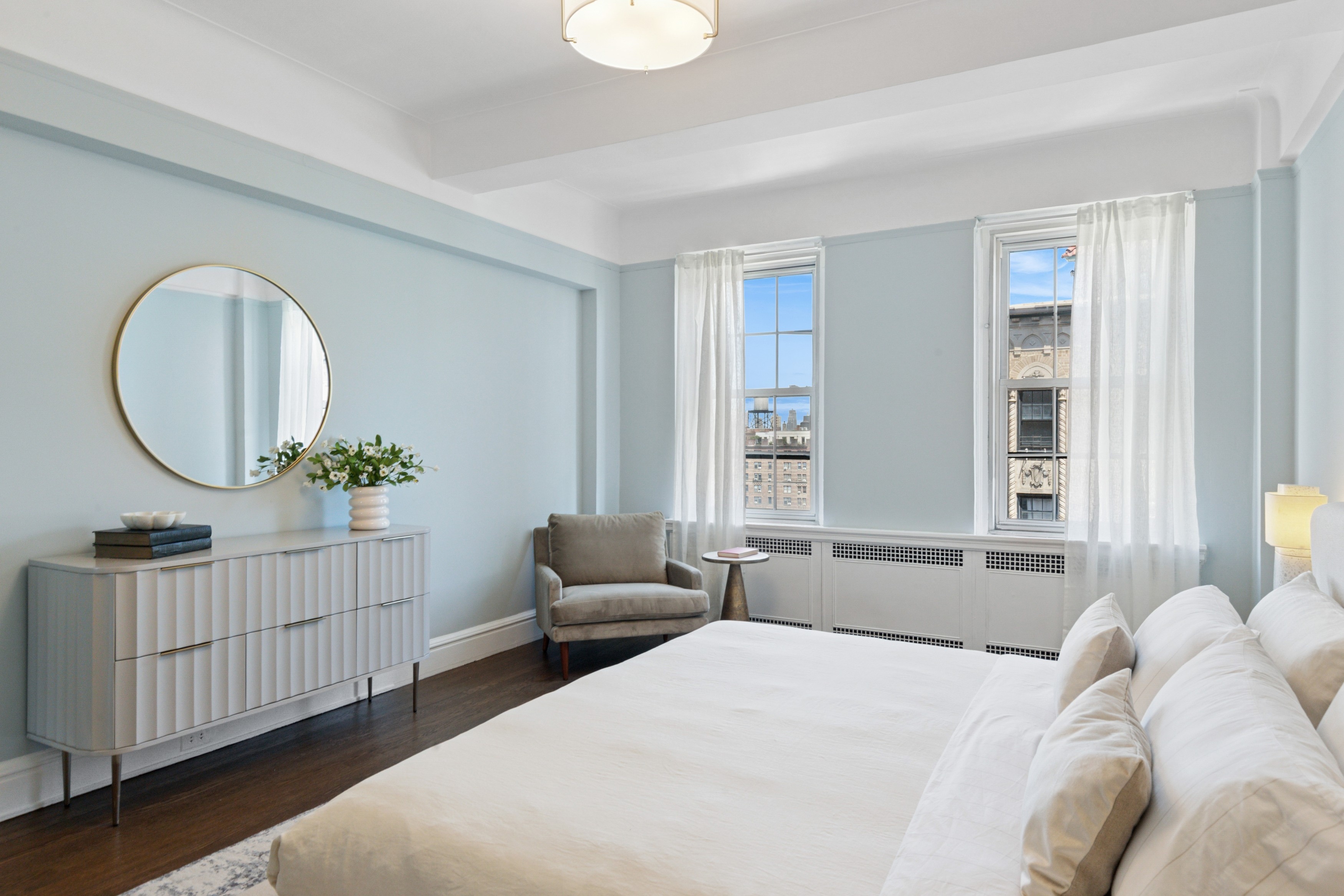 336 Central Park West, Unit 16F Manhattan, NY 10025 - Photo 10 of 18 a bedroom with bed and a window
