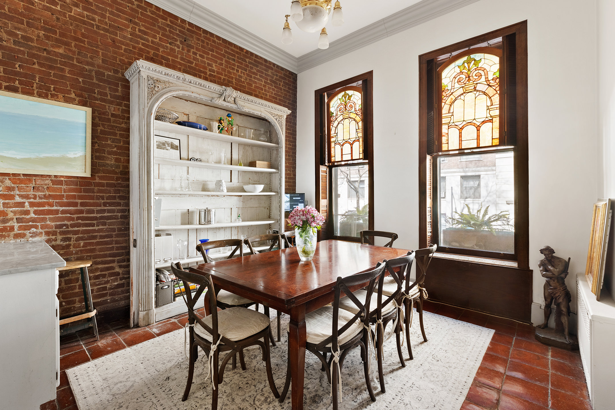138 West 73rd Street Manhattan, NY 10023 - Photo 9 of 35 a dining room with furniture and window