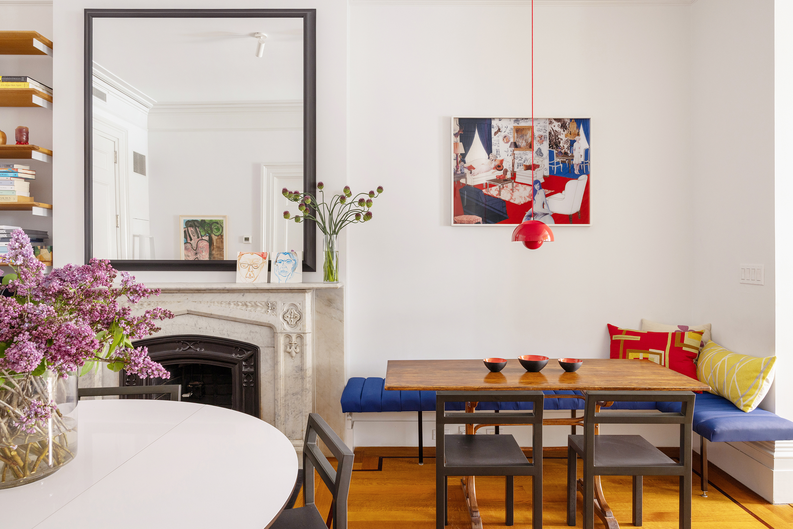 9 West 16th Street, Unit 3 Manhattan, NY 10011 - Photo 6 of 16 a view of a workspace with furniture wooden floor and a fireplace