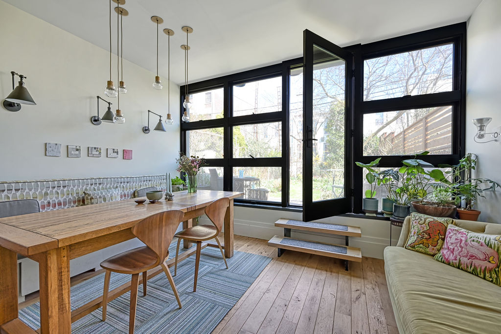 315 15th Street Brooklyn, NY 11215 - Photo 9 of 25 a living room with furniture and floor to ceiling windows