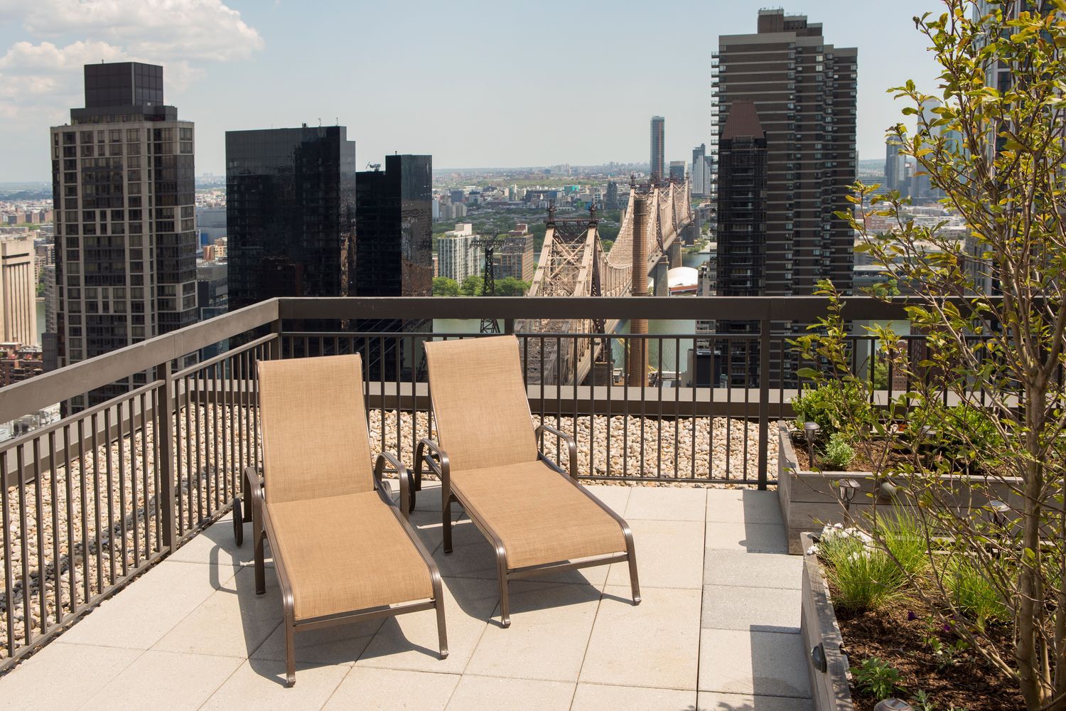 300 East 59th Street, Unit 3105 Manhattan, NY 10022 - Photo 15 of 21 a view of balcony with couch
