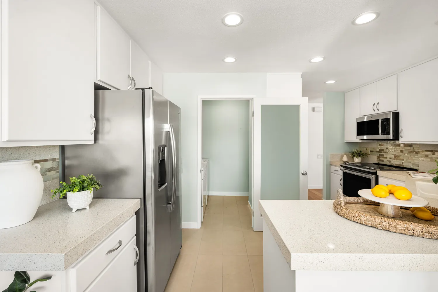 a balcony view with couple of chairs