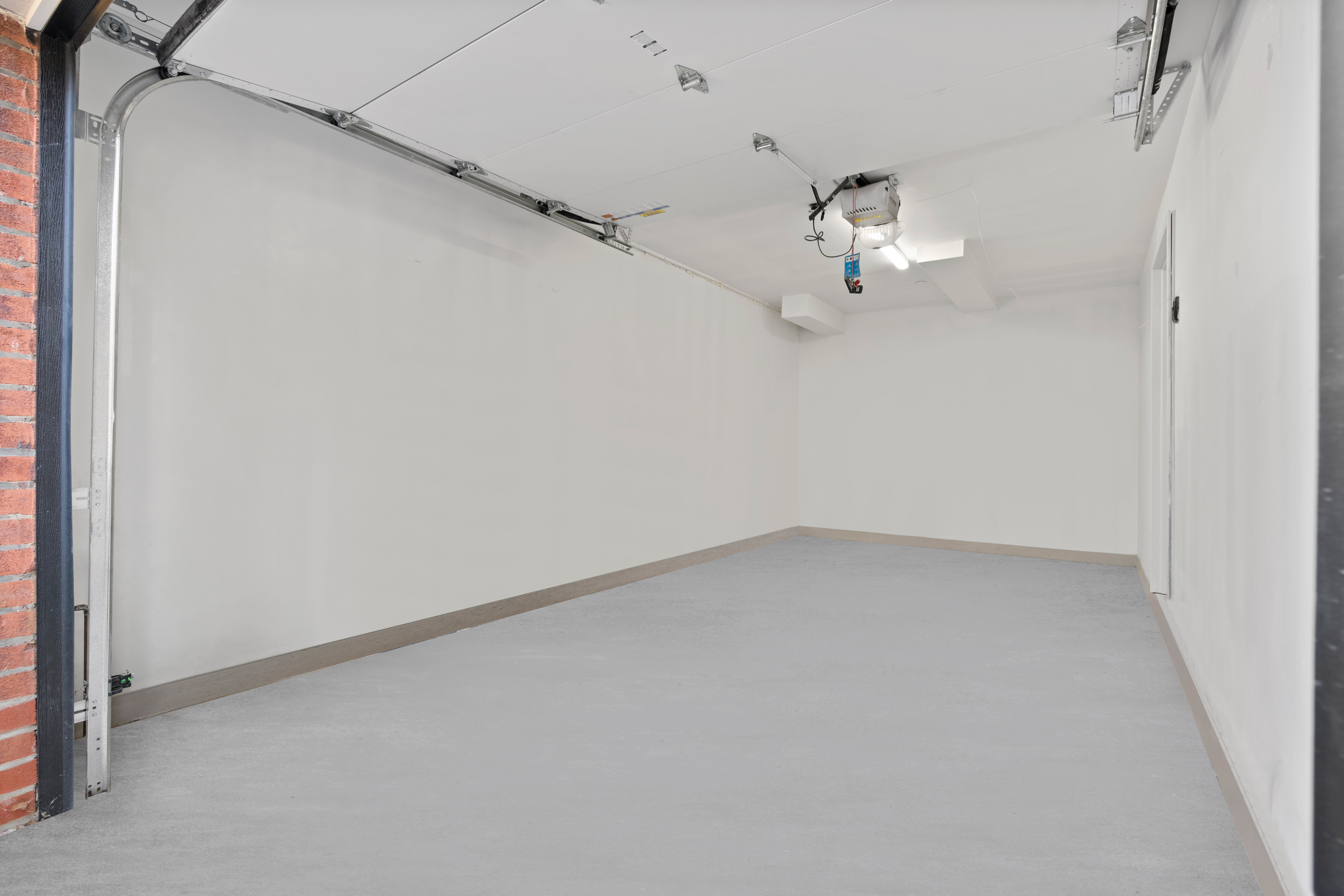 20-15 46th Street, Unit 2 Queens, NY 11105 - Photo 15 of 16 a view of a small space with a ceiling fan and wooden floor