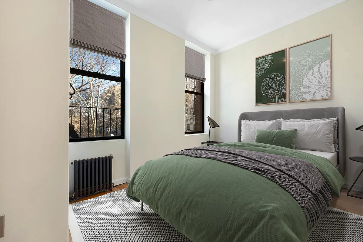 370 Columbus Avenue, Unit 1F Manhattan, NY 10024 - Photo 4 of 11 a bedroom with a bed and a window