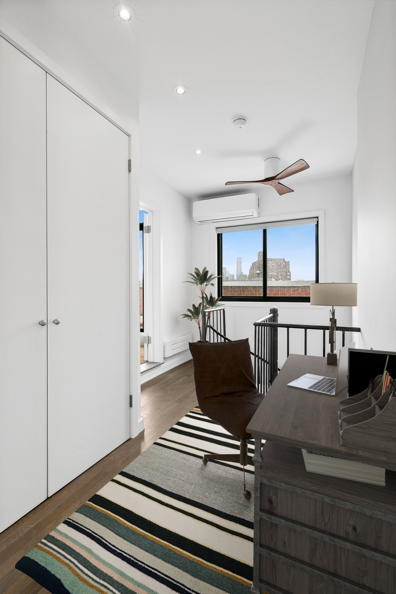 350 West 14th Street, Unit PHB Manhattan, NY 10014 - Photo 6 of 15 a living room with furniture and a table