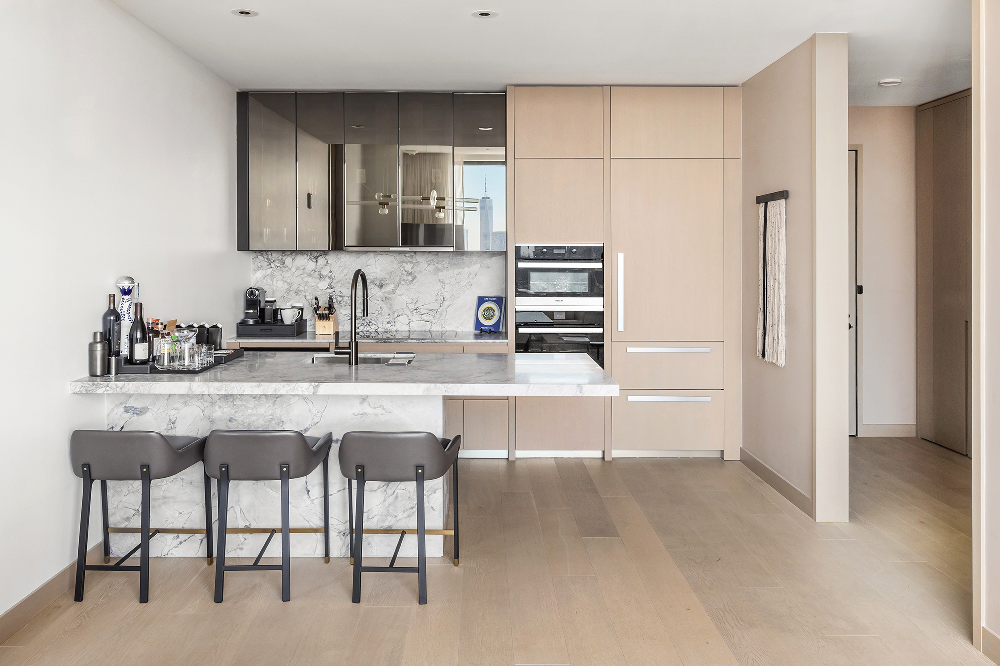 25 West 28th Street, Unit PH42B Manhattan, NY 10001 - Photo 9 of 15 a kitchen with appliances a sink and cabinets