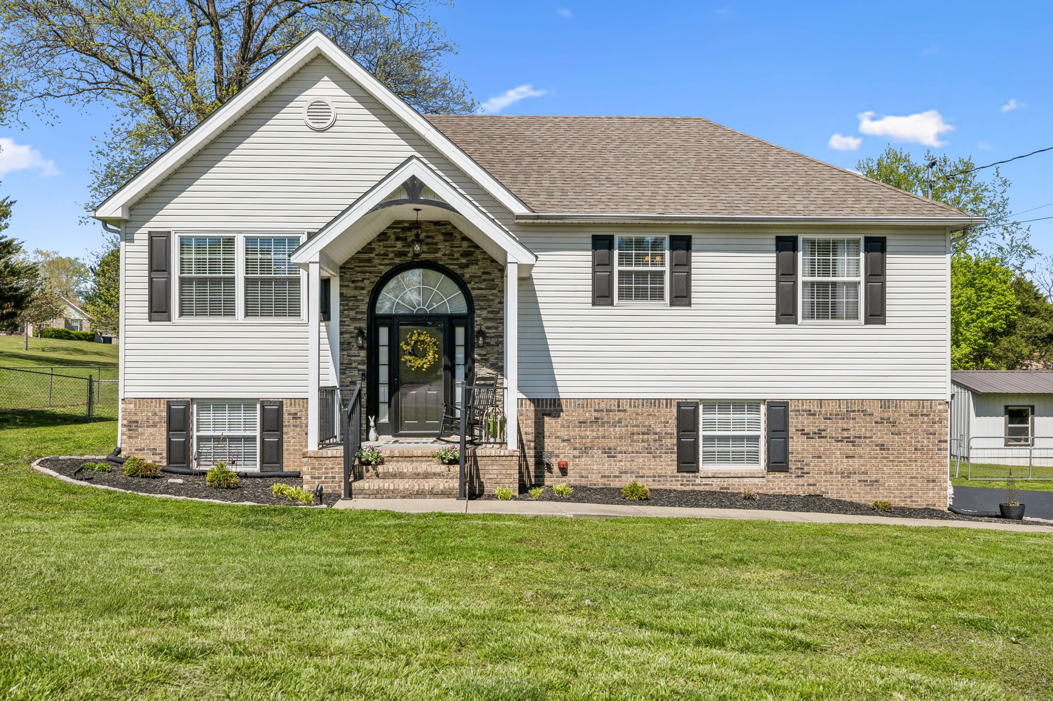 405 Billy Lane Spring Hill, TN 37174 - Photo 4 of 39 a view of a house with a yard
