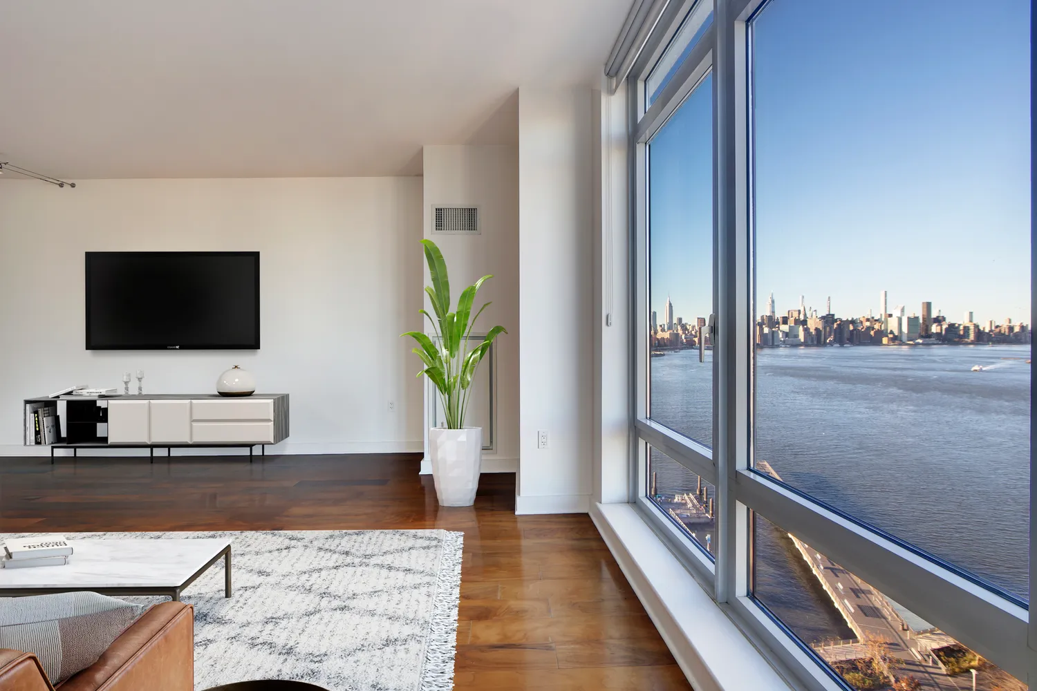 a view of a living room and a flat screen tv