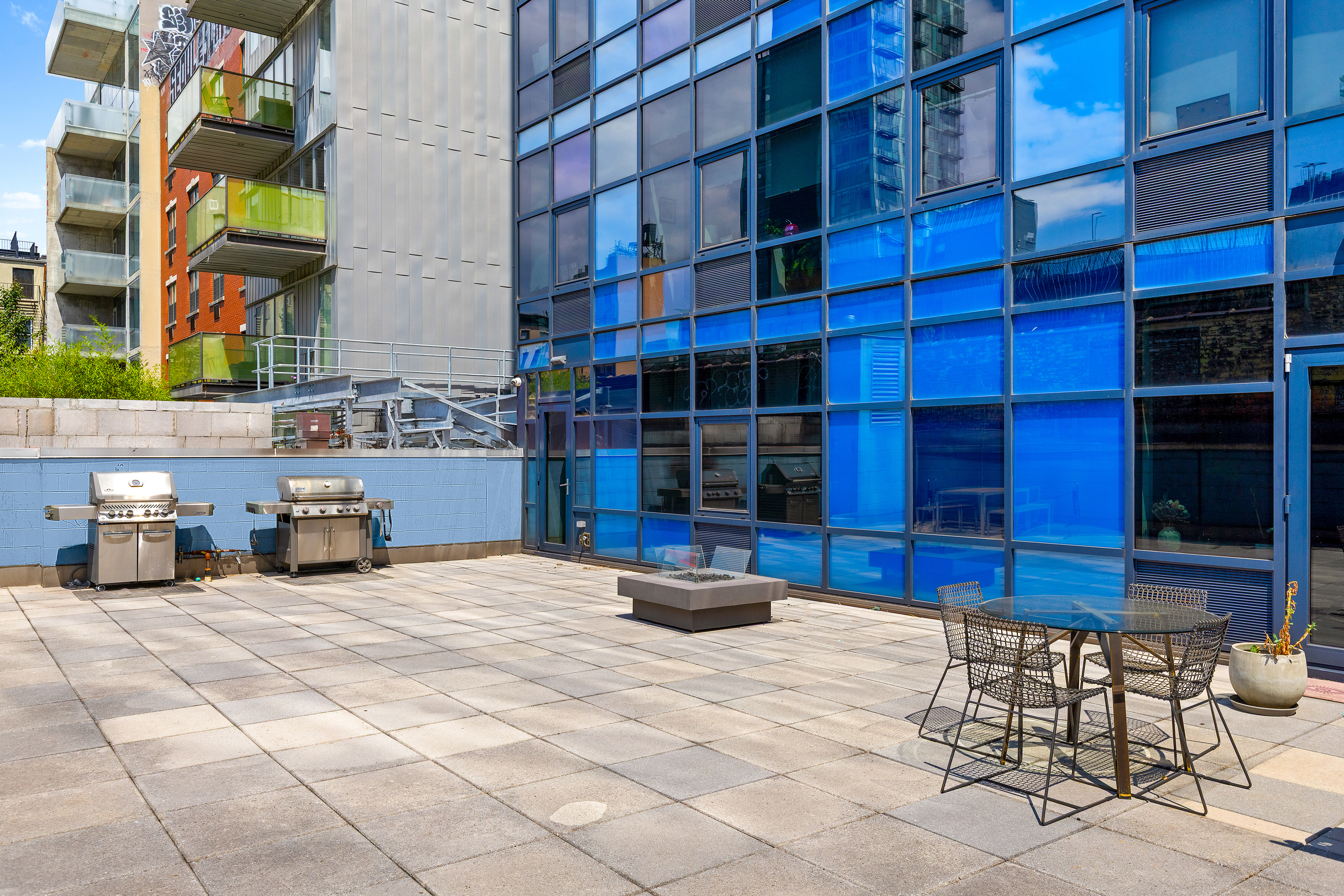 105 Norfolk Street, Unit 7A Manhattan, NY 10002 - Photo 12 of 14 a view of a chairs and a table in the patio