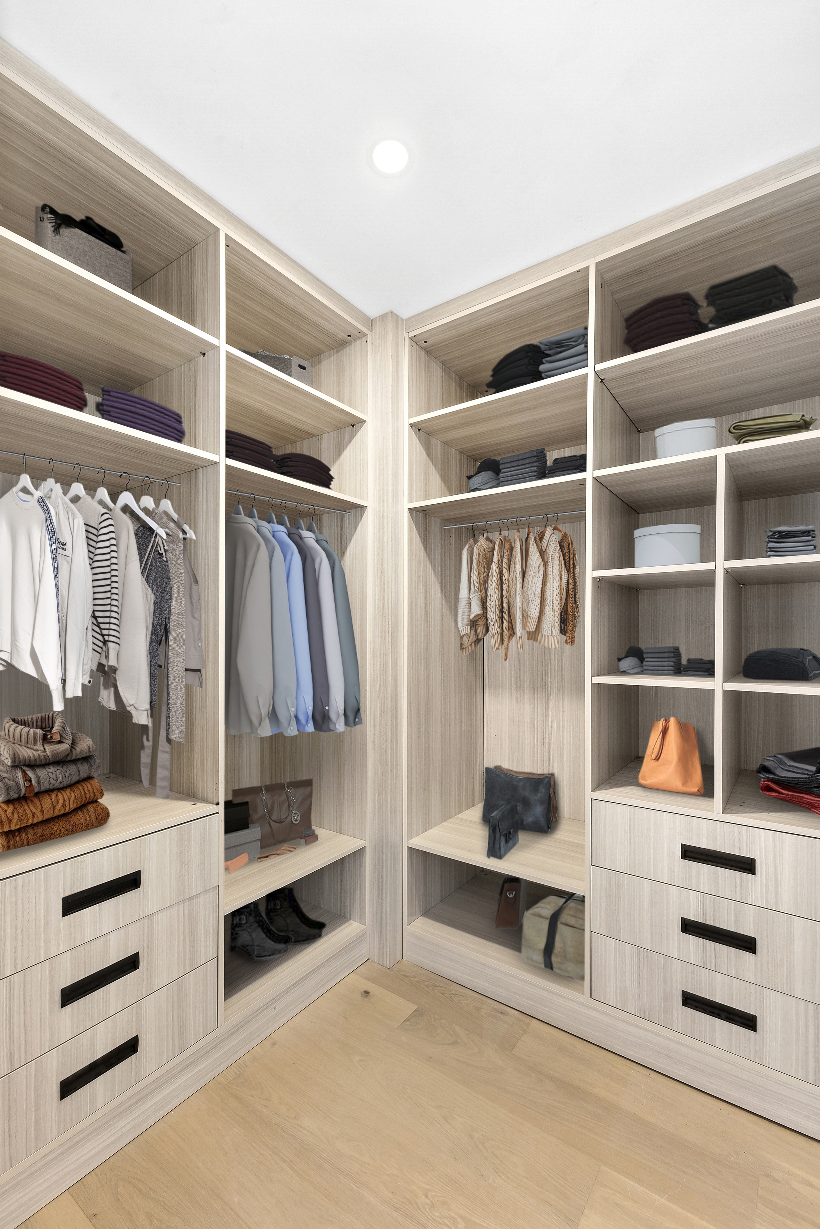 12-16 30th Avenue, Unit 404 Queens, NY 11102 - Photo 8 of 18 a view of walk in closet with clothes and shoes