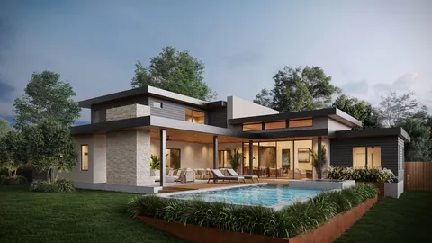 a front view of a house with yard and green space