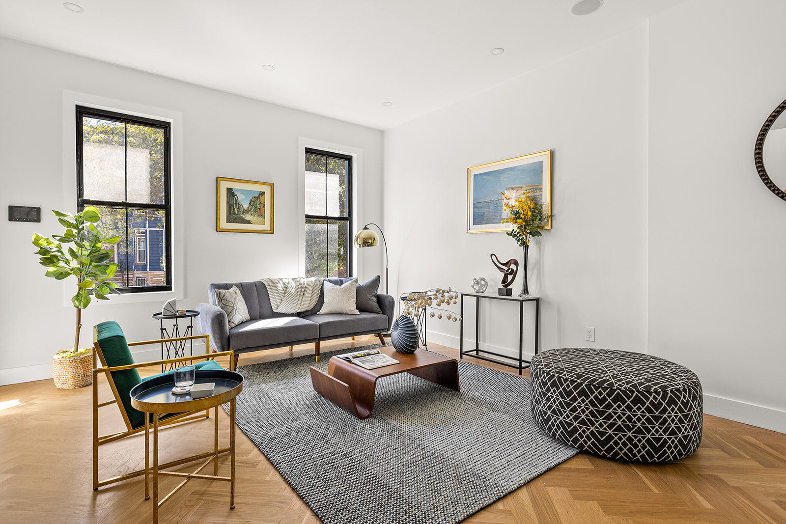 661 Decatur Street Brooklyn, NY 11233 - Photo 4 of 13 a living room with furniture and painting on the wall