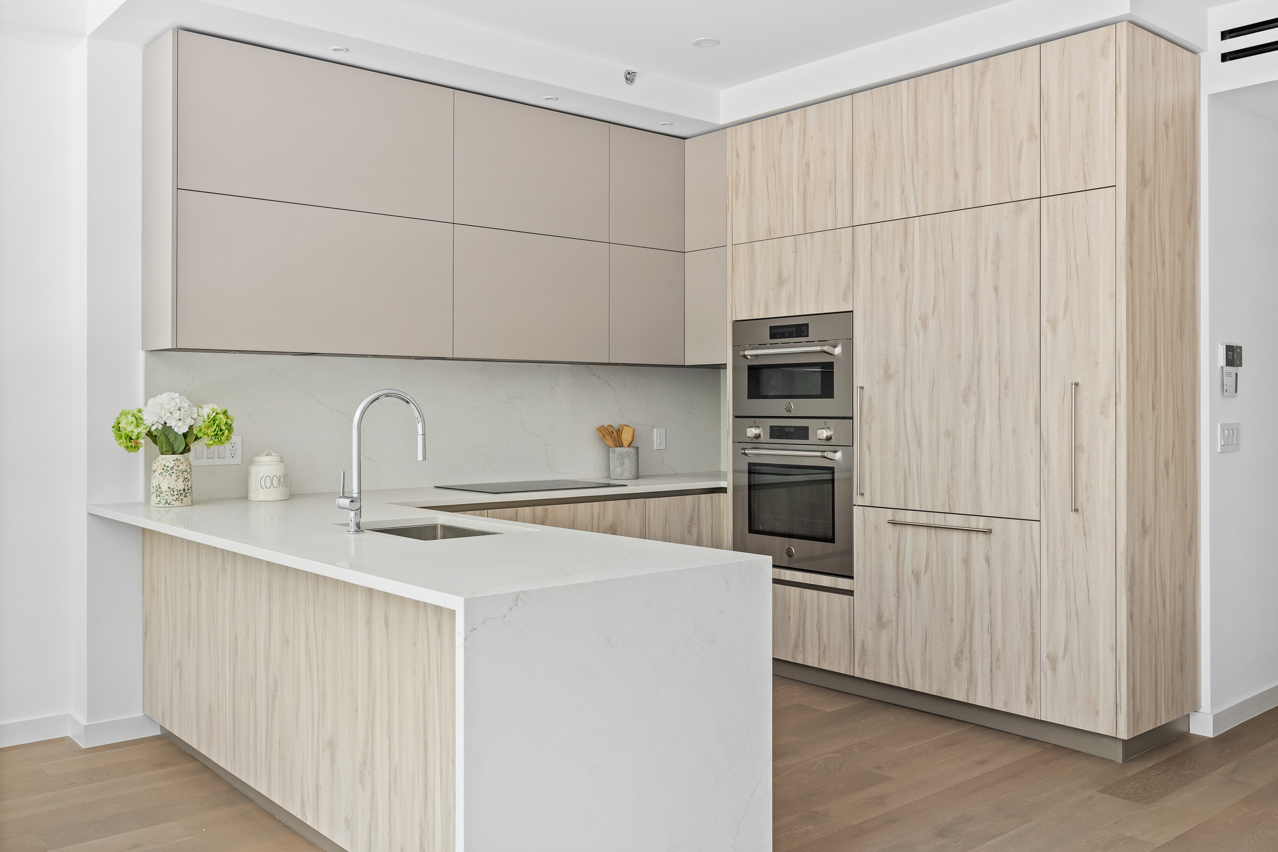 249 18th Street, Unit 3 Brooklyn, NY 11215 - Photo 4 of 14 a kitchen with stainless steel appliances a refrigerator sink and cabinets