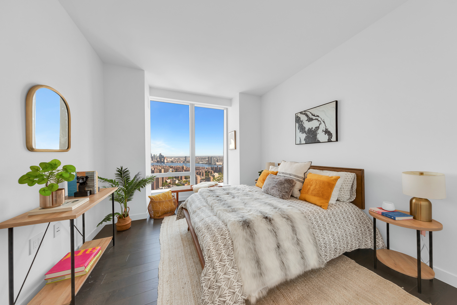 252 South Street, Unit 53E Manhattan, NY 10002 - Photo 4 of 17 a bedroom with bed and a large window