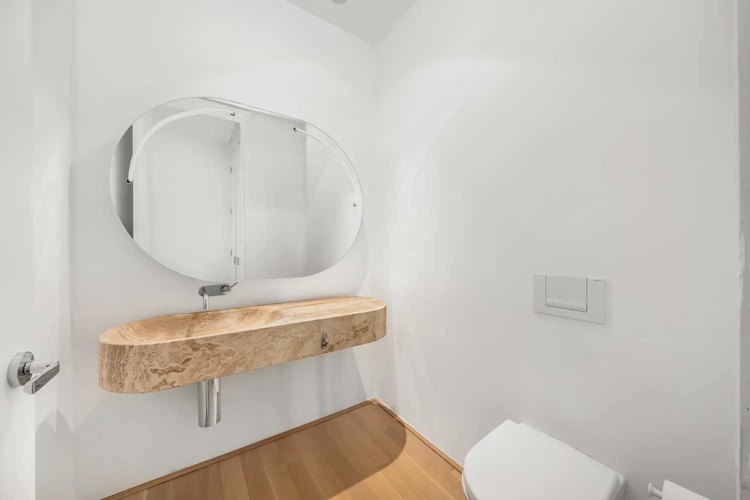 a bathroom with a sink mirror and vanity