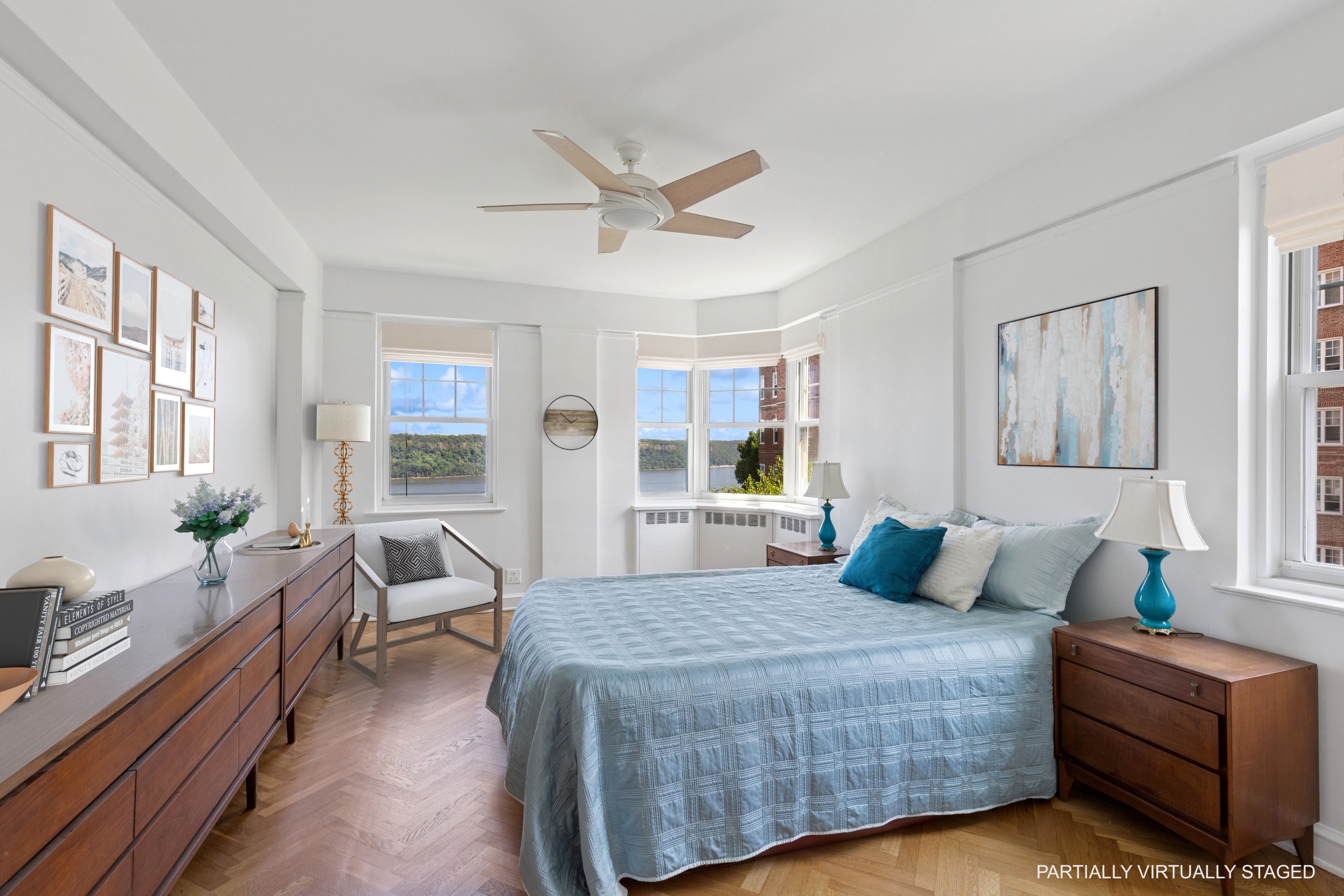 120 Cabrini Boulevard, Unit 48 Manhattan, NY 10033 - Photo 8 of 23 a bedroom with a large bed and a couch