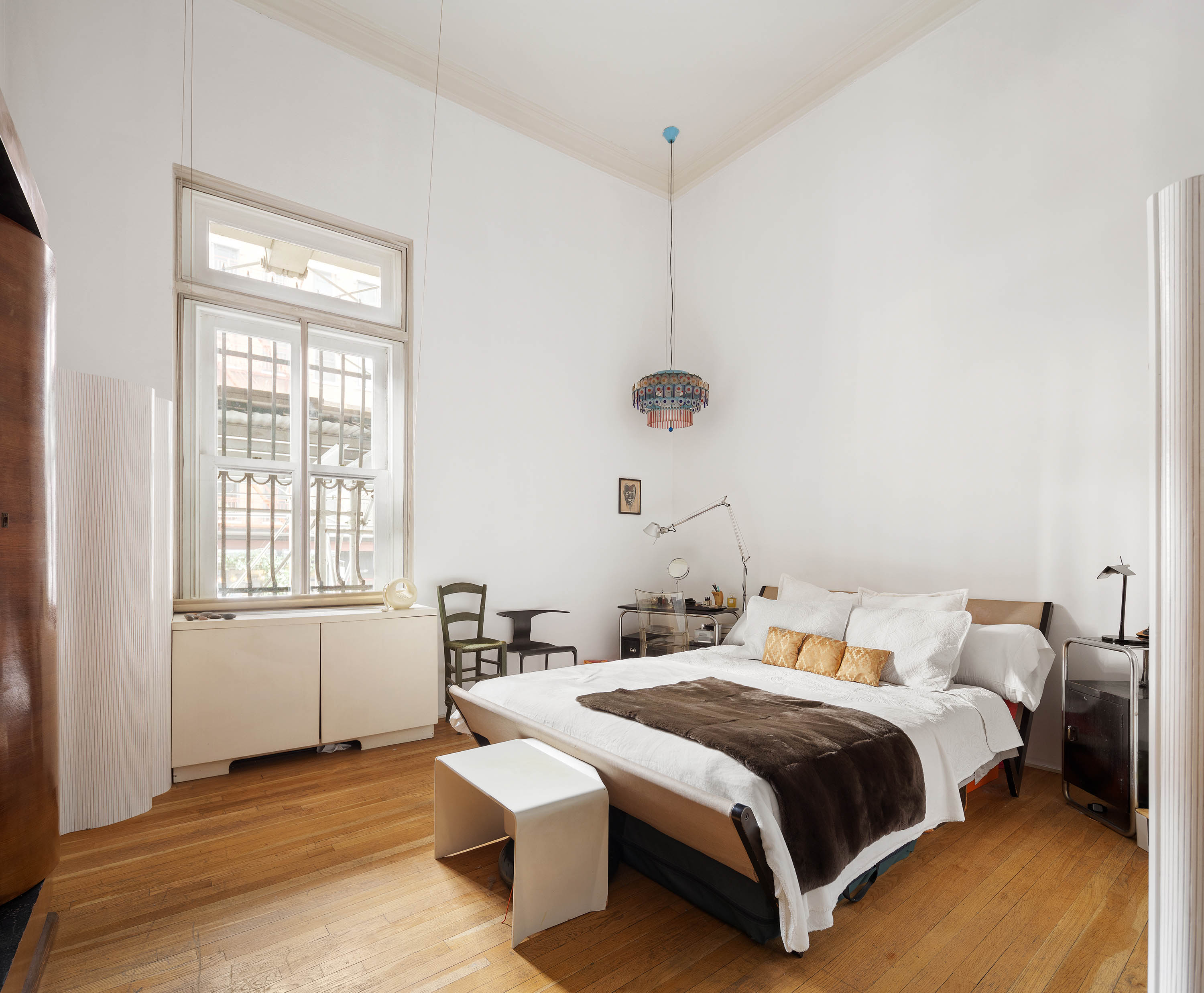 240 Centre Street, Unit 2B Manhattan, NY 10013 - Photo 6 of 12 a bedroom with bed and window