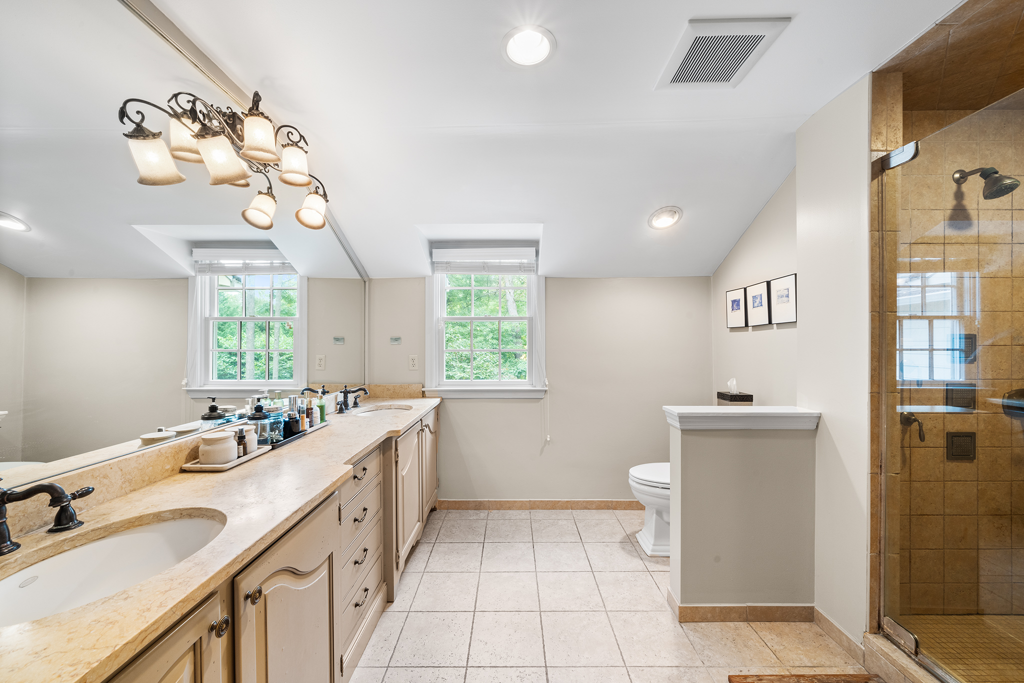 718 Arlington Road Narberth, PA 19072 - Photo 20 of 47 a bathroom with a sink a vanity and a mirror