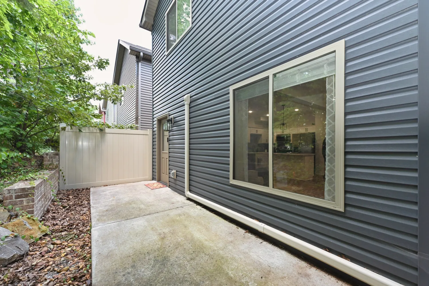 a view of a door and a window