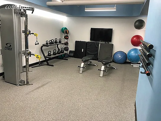 400 East 85th Street, Unit 4L Manhattan, NY 10028 - Photo 10 of 12 a view of a room with gym equipment
