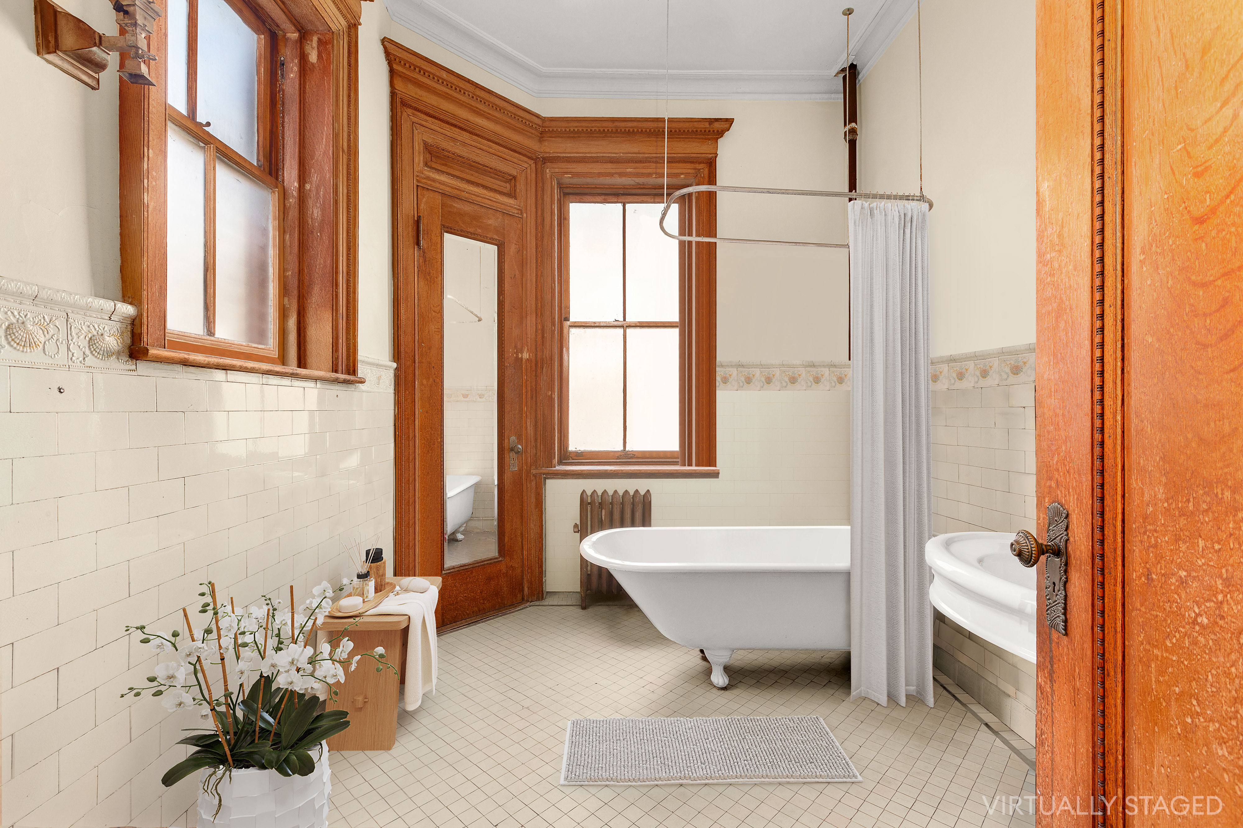 117 West 120th Street Manhattan, NY 10027 - Photo 20 of 31 a living room with furniture and a window