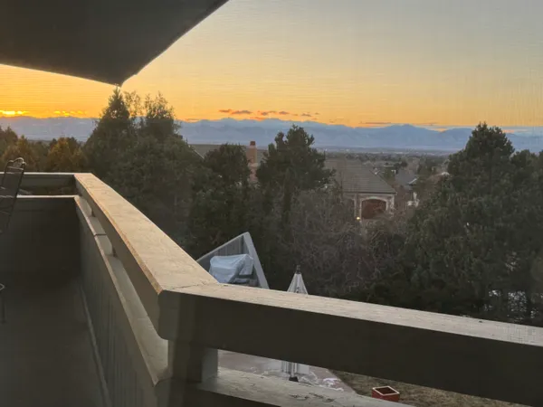 a view of a balcony with a sink