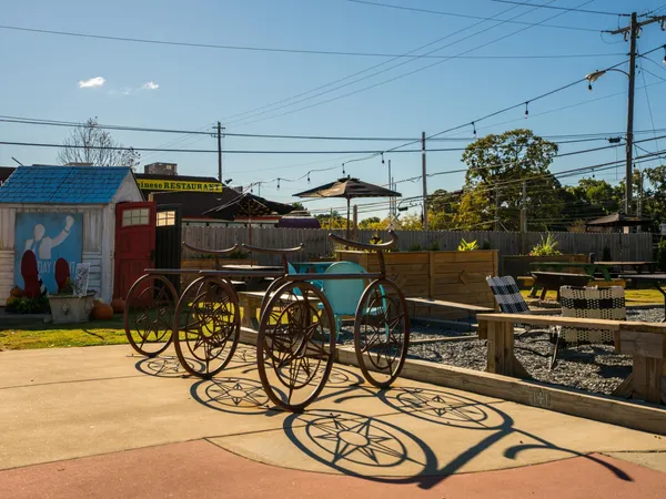 a view of a chairs and table in a patio