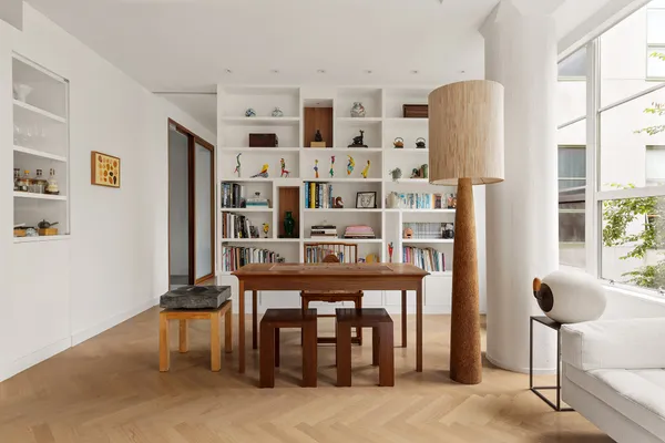 a view of a livingroom with furniture and window
