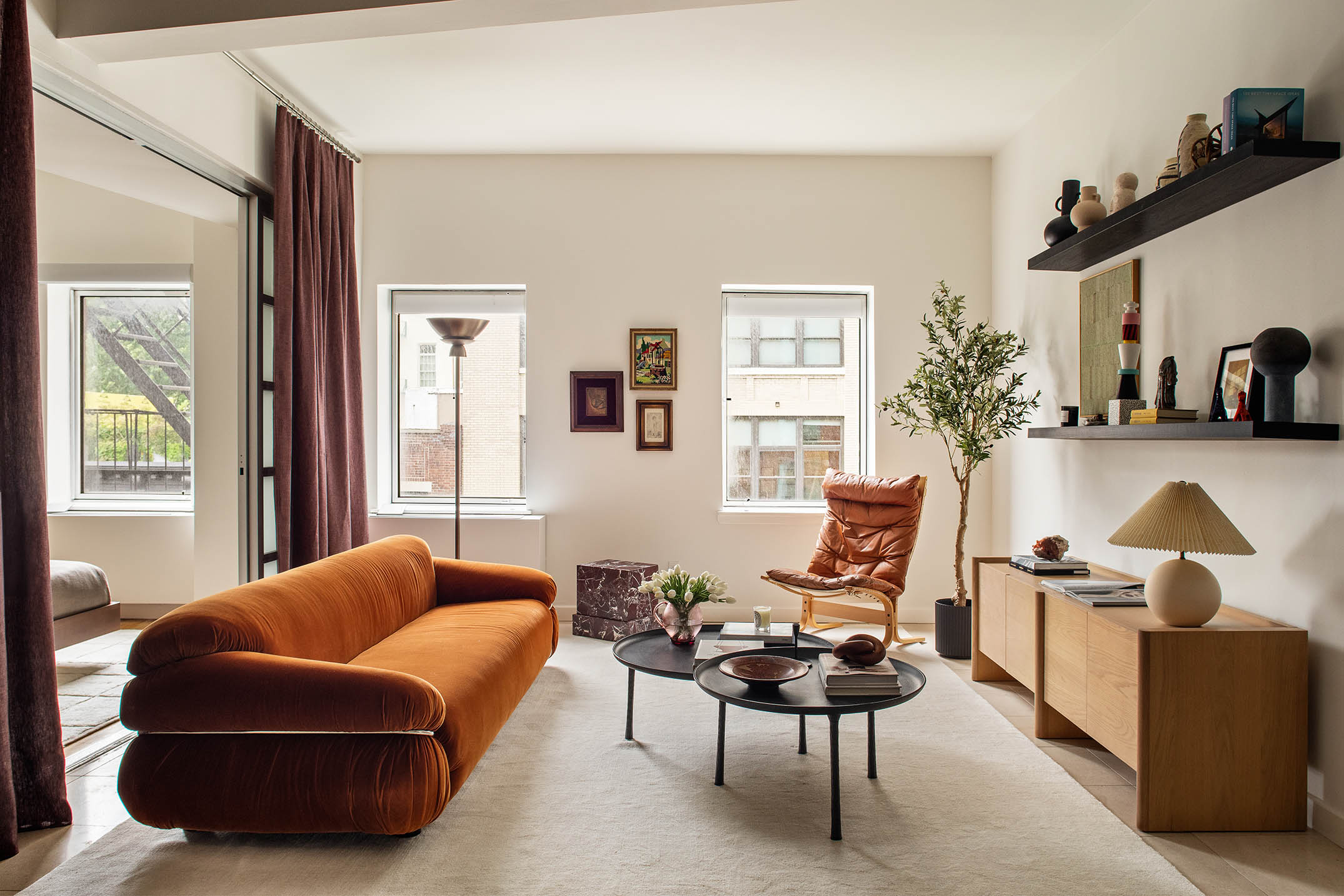 204 West Houston Street, Unit 4B Manhattan, NY 10014 - Photo 2 of 10 a living room with furniture rug and window