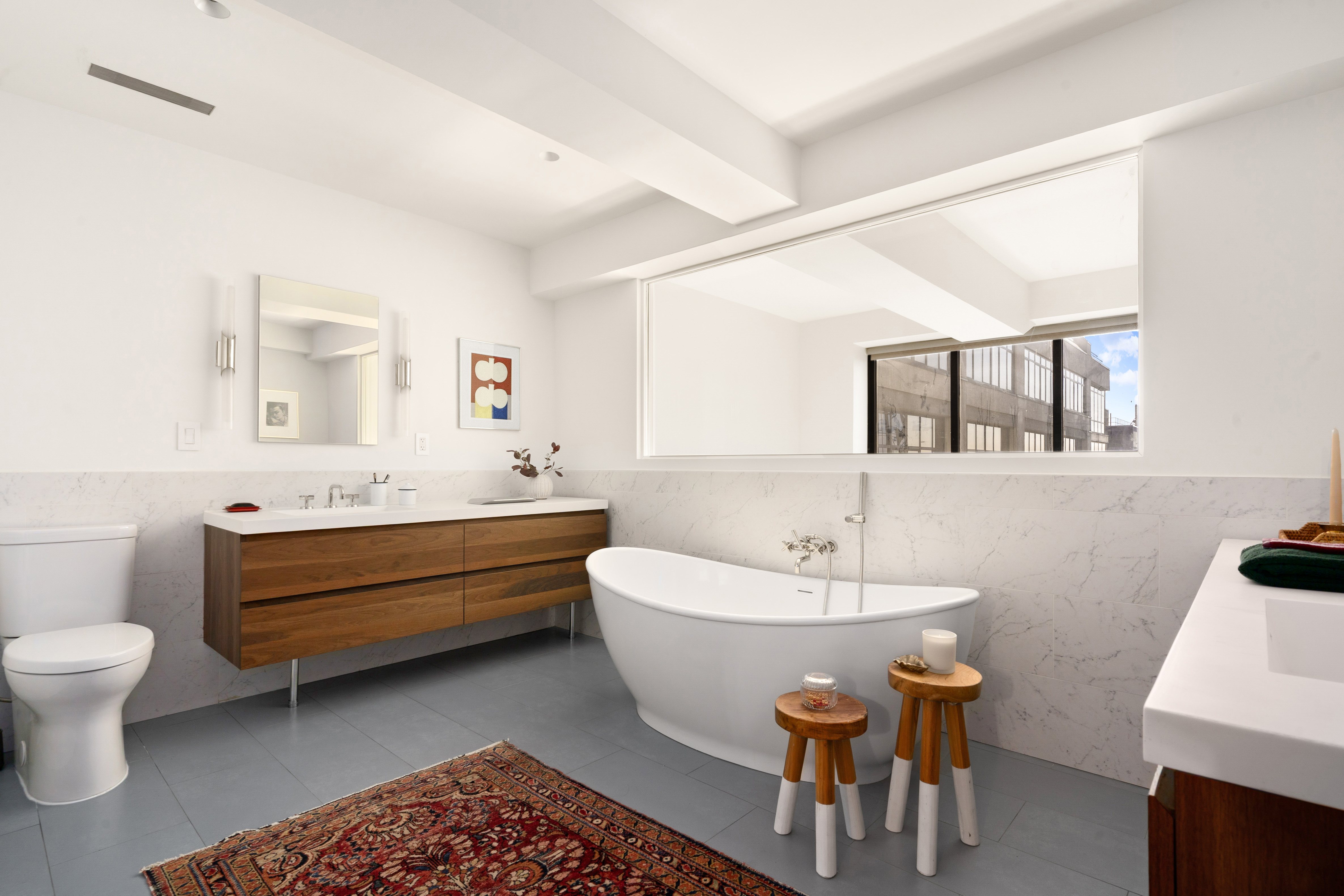 360 Furman Street, Unit 1041/1042 Brooklyn, NY 11201 - Photo 12 of 30 a bathroom with a sink and a mirror